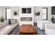 Cozy living room featuring a modern fireplace, comfortable sofas, stylish decor, and natural light at 2117 Broadway St, Indianapolis, IN 46202