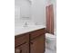 Bathroom with modern vanity, stylish fixtures, and combined shower-tub at 2243 E Werges Ave, Indianapolis, IN 46237