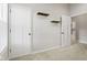 Bright bedroom with neutral walls, plush carpeting, and ample closet space at 2243 E Werges Ave, Indianapolis, IN 46237