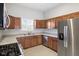 Modern kitchen features stainless steel appliances, granite countertops, and ample counter space at 2243 E Werges Ave, Indianapolis, IN 46237
