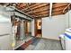 Unfinished basement with utilities, carpeted area, and potential for customization at 2521 Beechcrest Dr, Indianapolis, IN 46203
