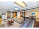 Staged basement featuring seating, dining and small kitchenette at 2521 Beechcrest Dr, Indianapolis, IN 46203