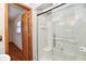 Bright bathroom featuring a glass enclosed shower and updated fixtures at 2521 Beechcrest Dr, Indianapolis, IN 46203