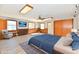 Bright bedroom featuring natural light, light wood floors, and a ceiling fan at 2521 Beechcrest Dr, Indianapolis, IN 46203