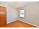 Bright bedroom features hardwood floors and a window providing natural light at 2521 Beechcrest Dr, Indianapolis, IN 46203