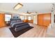 Bright bedroom featuring natural light, light wood floors, and a ceiling fan at 2521 Beechcrest Dr, Indianapolis, IN 46203