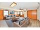 Bright living room featuring neutral furniture, blue accents, and natural light at 2521 Beechcrest Dr, Indianapolis, IN 46203