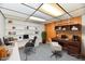 Home office with wood paneling and functional shelving and deskspace at 2521 Beechcrest Dr, Indianapolis, IN 46203