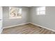 Bedroom featuring natural light, modern flooring, and neutral paint at 305 Bixler Rd, Indianapolis, IN 46227