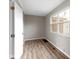 Bedroom with modern wood flooring, neutral walls, and plenty of natural light at 305 Bixler Rd, Indianapolis, IN 46227