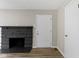 The living room has a fireplace, and new floors, freshly painted at 305 Bixler Rd, Indianapolis, IN 46227