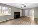 Spacious living room with new floors, fresh paint, and a fireplace at 305 Bixler Rd, Indianapolis, IN 46227