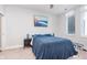 Inviting bedroom with a plush bed, soft carpet, and a calming ocean view artwork at 319 E 16Th St # 203, Indianapolis, IN 46202