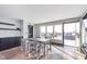 Community room with seating area, kitchenette, and access to an outdoor space at 319 E 16Th St # 203, Indianapolis, IN 46202