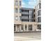 Close up of the building's street entrance with a black framed design at 319 E 16Th St # 203, Indianapolis, IN 46202
