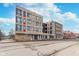 Modern building exterior with large windows and brick facade on a sunny day at 319 E 16Th St # 203, Indianapolis, IN 46202