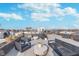 Large rooftop patio with lounge seating, planters, and views of the city skyline at 319 E 16Th St # 203, Indianapolis, IN 46202