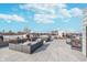Wide angle of rooftop featuring lounge seating, patio, and downtown views at 319 E 16Th St # 203, Indianapolis, IN 46202