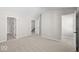 Open bedroom with plush carpet, multiple closets, and natural light at 4150 Douro Trl, Westfield, IN 46062