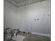 Utility room features tiled floors, plumbing, and painted walls, offering a functional space at 428 Cleveland St, Columbus, IN 47201