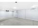 Spacious finished basement with neutral carpet and multiple windows at 4305 Central Ave, Indianapolis, IN 46205