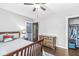 Bedroom featuring a vintage dresser, hardwood floors and ample closet space at 4305 Central Ave, Indianapolis, IN 46205