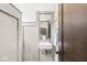 Compact half bath featuring a pedestal sink and modern finishes at 4305 Central Ave, Indianapolis, IN 46205