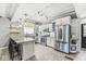 Updated kitchen with a center island, stainless appliances, and custom cabinets at 4305 Central Ave, Indianapolis, IN 46205