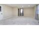 This carpeted bedroom features a large window and neutral wall color at 4623 Clark St, Anderson, IN 46013