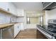 Modern kitchen featuring white cabinets, butcher block countertops, and stainless steel appliances at 4623 Clark St, Anderson, IN 46013