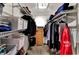 Walk-in closet with ample shelving and hanging space to organize clothes and accessories at 4783 Briarwood Trce, Carmel, IN 46033