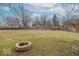 The large backyard includes a fire pit, promising outdoor gatherings and enjoyment at 4836 W 71St St, Indianapolis, IN 46268