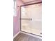 Bathroom featuring a new, white shower stall with a built-in seat and modern fixtures at 4836 W 71St St, Indianapolis, IN 46268