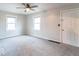 Spacious bedroom with neutral walls, carpet flooring, and great natural light at 4836 W 71St St, Indianapolis, IN 46268