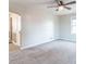 Comfortable living room featuring neutral paint and plush gray carpeting at 4836 W 71St St, Indianapolis, IN 46268