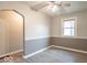 Cozy living room with neutral paint, carpeted floors, and great natural light at 4836 W 71St St, Indianapolis, IN 46268