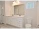 Bathroom featuring a double sink vanity with modern fixtures and finishes at 5176 Green Valley Ln, Noblesville, IN 46062