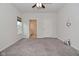 Bedroom with ceiling fan, carpet, bathroom and closet access at 5176 Green Valley Ln, Noblesville, IN 46062