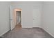 A bedroom features neutral carpeting and access to a closet and an adjoined bathroom at 5176 Green Valley Ln, Noblesville, IN 46062