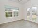 Well-lit dining area with access to backyard through patio door at 5176 Green Valley Ln, Noblesville, IN 46062