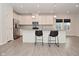 Kitchen view featuring stainless appliances, granite countertops, white cabinets, kitchen island, and an eating area at 5176 Green Valley Ln, Noblesville, IN 46062