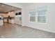 Well-lit living room that adjoins a bright modern kitchen at 5176 Green Valley Ln, Noblesville, IN 46062