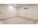 Bedroom with luxury vinyl plank flooring and natural lighting at 5210 Ashbourne Ln, Indianapolis, IN 46226
