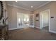 Spacious lobby featuring paneled doors, neutral color palette, and an inviting transition into the living space at 5546 Tart Blvd, Indianapolis, IN 46239