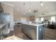 Spacious open layout integrating the kitchen, dining area, and living room, ideal for entertaining and modern living at 5546 Tart Blvd, Indianapolis, IN 46239