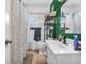 Modern bathroom with a large mirror, modern sink, and a walk in shower at 606 Memorial Dr, Beech Grove, IN 46107