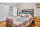 Comfortable bedroom features hard wood floors, and closet storage at 606 Memorial Dr, Beech Grove, IN 46107