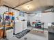 A laundry room with a washer, dryer, and storage racks and space for sorting and folding clothes at 606 Memorial Dr, Beech Grove, IN 46107