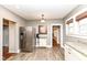Additional view of the kitchen and featuring stainless steel appliances and tile flooring at 6179 Norwaldo Ave, Indianapolis, IN 46220