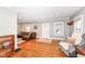 Spacious living room with hardwood floors and ample natural light at 6179 Norwaldo Ave, Indianapolis, IN 46220